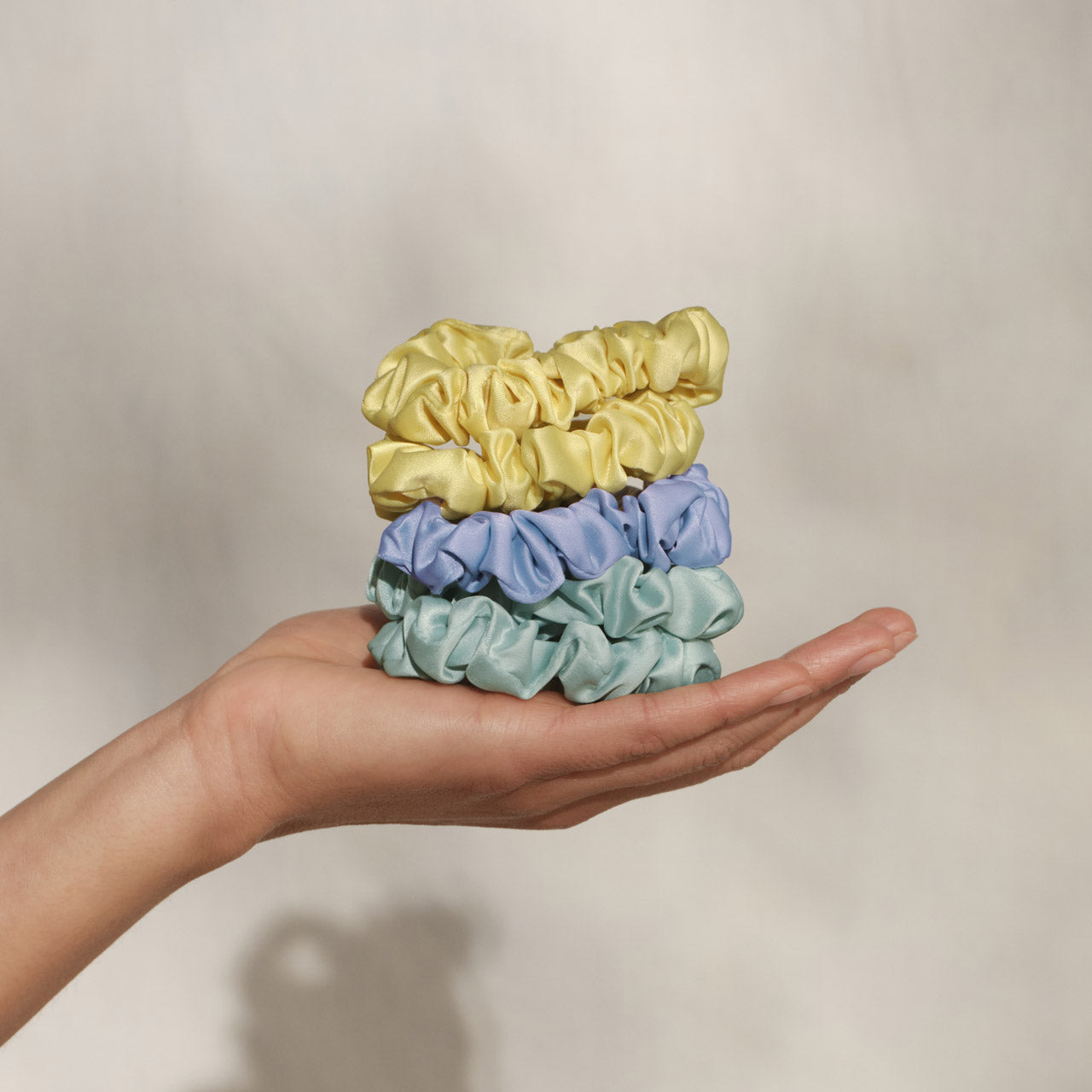 509235-CoastalCottage-RuchedSatinScrunchies-5pc-MultiColor-Model-1280x1280px.jpg