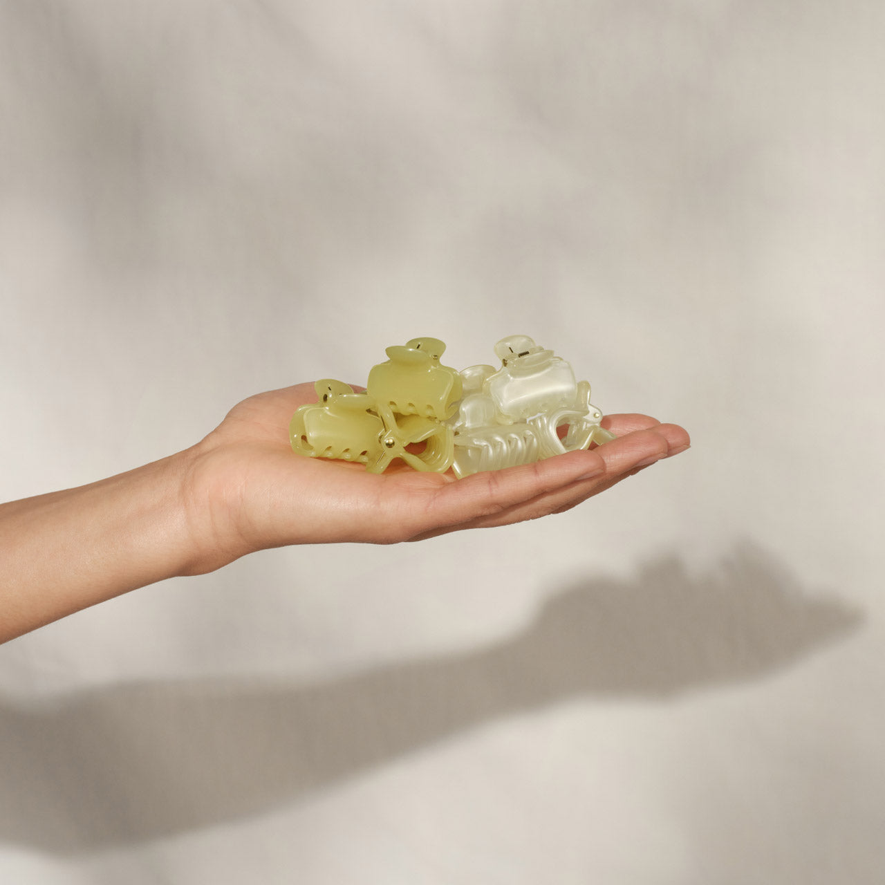 509259-CoastalCottage-MiniJellyCloudClips-8pc-PearlizedCream_ButterYellow-Model-1280x1280px.jpg
