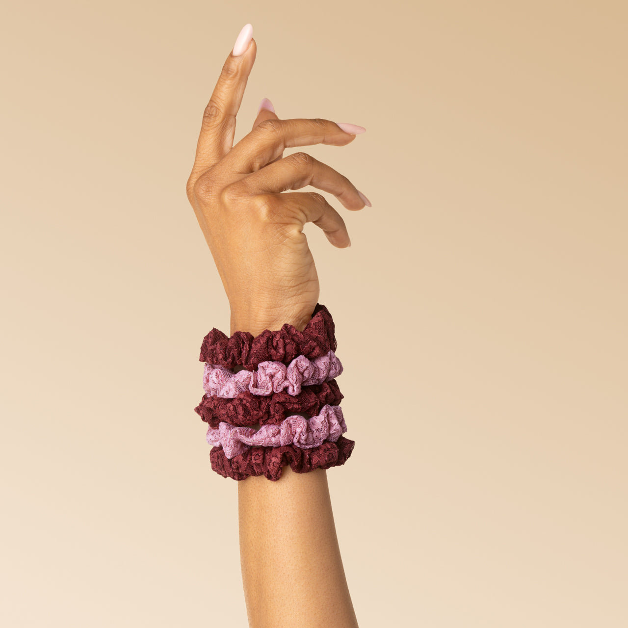 512754-RuchedLaceScrunchies-5pc-Hair-CherryLacquer_DustyPink-Model-Hand-1280x1280px.jpg