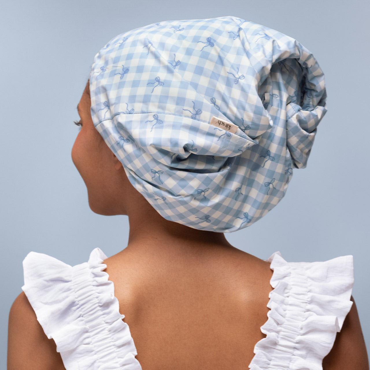 513706-SatinLinedFlexiShowerCap-Cleanse-GinghamBlue-Model-2-1280x1280px-1.jpg