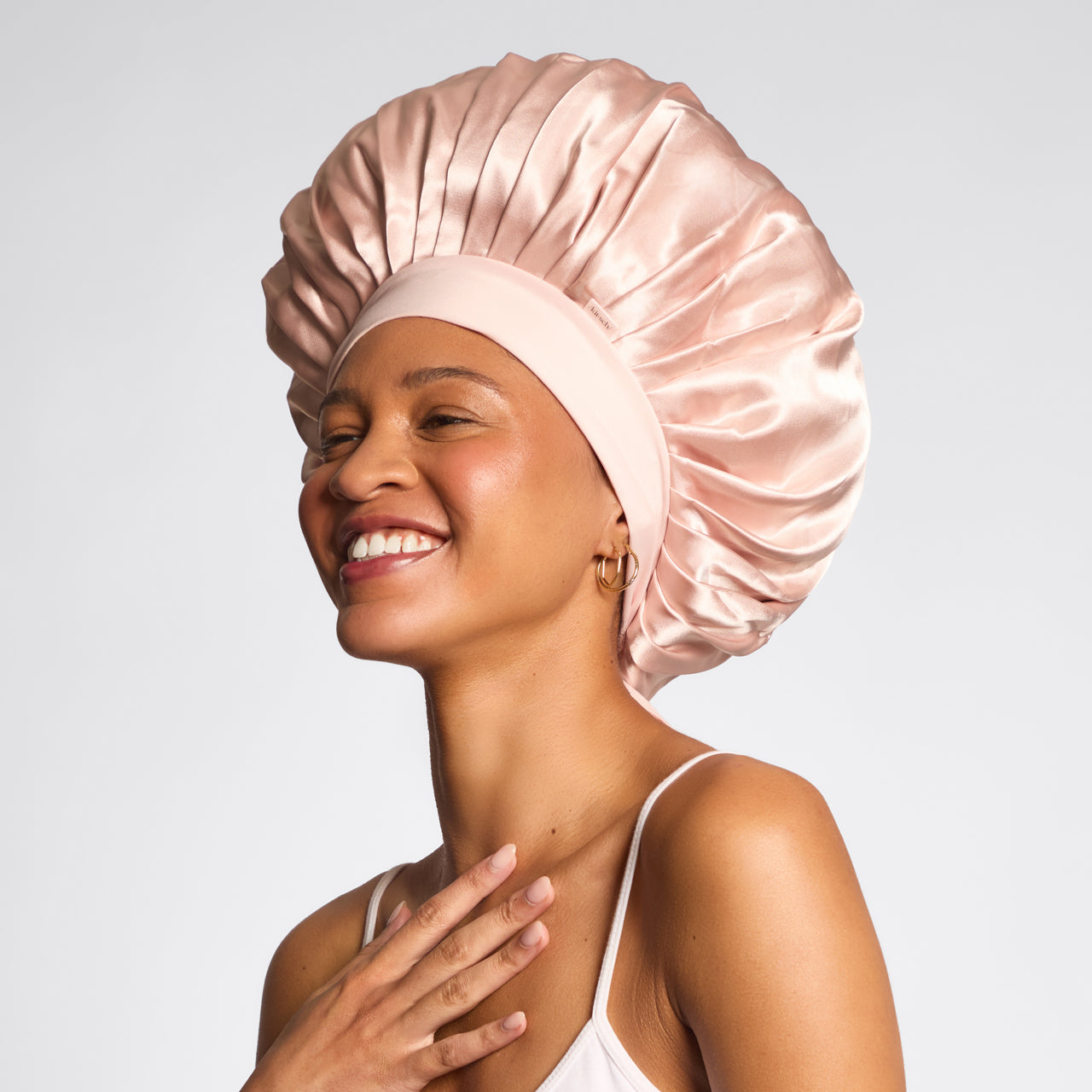 69919-AdjustableOversizedSatinBonnet-Sleep-Blush-Model-1-1280x1280px.jpg