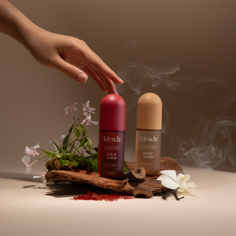Headline_New_Hair_Perfumes_to_Enchant_Every_Moment_Text_Discover_two_unforgettable_scents_for_your_hair_ritual._Oak_Amber_a_woody_smoky_embrace_that_feels_like_a_golden_evening_by_the.png